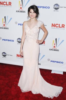 Selena Gomez (Tracy Reese elbisesi giyiyor) Nclr için gelenler 2009 Alma Ödülleri, Royce Hall Ucla Kampüsü, Los Angeles, Ca Eylül 17, 2009. Fotoğraf: Roth Stok / Everett Koleksiyonu