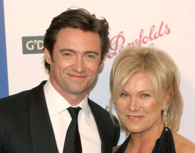 Hugh Jackman, Deborra-Lee Furness at arrivals for Penfolds Icon Gala G''DAY LA: Australia Week 2006 Dinner, The Hollywood Palladium, Los Angeles, CA, Saturday, January 14, 2006. Photo by: John Hayes/Everett Collection clipart