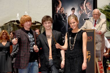Rupert Grint, Daniel Radcliffe, Emma Watson at the induction ceremony for Harry Potter Foot-Print and Wand-Print Ceremony, Grauman''s Chinese Theatre, Los Angeles, CA, July 09, 2007. Photo by: Dee Cercone/Everett Collection clipart