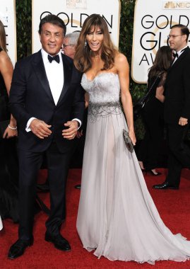 Sylvester Stallone, Jennifer Flavin 73 Yıllık Altın Küre Ödülleri için gelenler 2015 - Gelenler 3, Beverly Hilton Hotel, Beverly Hills, Ca Ocak 10, 2016. Fotoğraf: Dee Cercone /Everett Collection