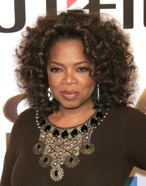 Oprah Winfrey at arrivals for THE GREAT DEBATERS Premiere, ArcLight Cinerama Dome, Los Angeles, CA, December 11, 2007. Photo by: Adam Orchon/Everett Collection clipart