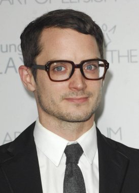 Elijah Wood Elysium Heaven Gala Sanatı için gelenler, Hangar 8, Santa Monica, Ca Ocak 10, 2015. Fotoğraf: Elizabeth Goodenough / Everett Koleksiyonu