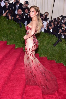 Jennifer Lopez (wearing Versace) at arrivals for 'CHINA: Through The Looking Glass' Opening Night Met Gala - Part 3, The Metropolitan Museum of Art Costume Institute, New York, NY May 4, 2015. Photo By: Gregorio T. Binuya/Everett Collection clipart