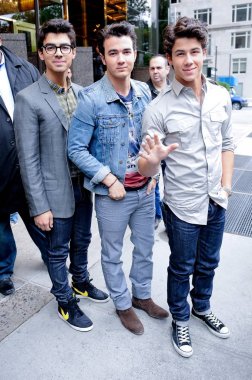 Joe Jonas, Kevin Jonas, Nick Jonas, leave their Midtown Manhattan hotel out and about for CELEBRITY CANDIDS - WEDNESDAY, , New York, NY May 19, 2010. Photo By: Ray Tamarra/Everett Collection