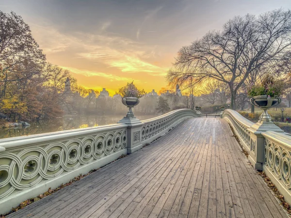 The Bow Bridge  is a cast iron bridge located in Central Park, New York City, crossing over The Lake