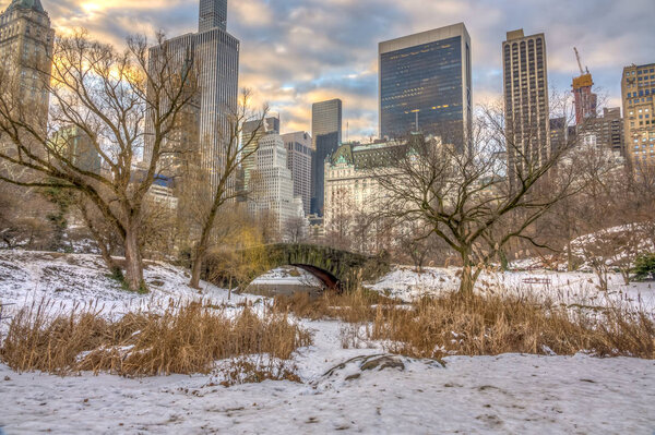 Gapstow Bridge is one of the icons of Central Park, Manhattan in New York City after snow storm