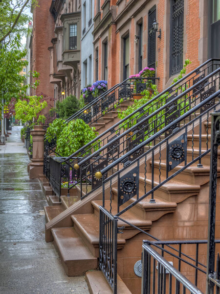 Brownstone on upper East side of New York City on rainy day