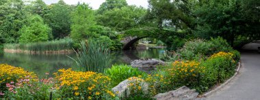 Gapstow Bridge in Central Park  in spring with flowers  clipart