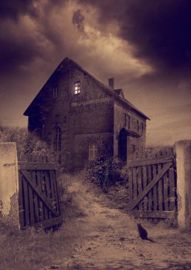 Penceredeki ışık ile eski terk edilmiş ve perili ev