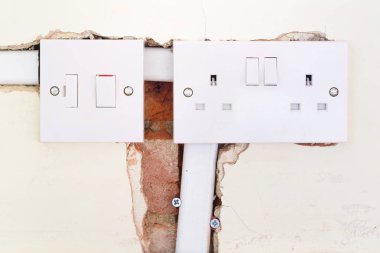 Bir İngiliz elektrik soketi ve geçiş sırasında bir iç uyumlanma closeup