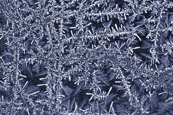 Detail of a hoar frost pattern texture. Suitable for use as a background. 