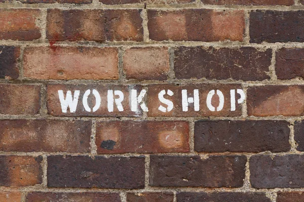 Workshop Sign Word Stencilled Old Vintage Grunge Style Brick Wall — Stock Photo, Image