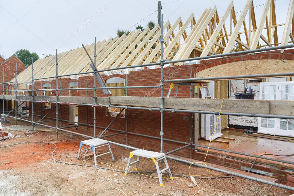 Building the annexe or annex to a house from brick and timber frame