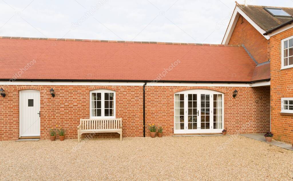Residential home addition (barn conversion) to provide a single storey annexe to a UK house