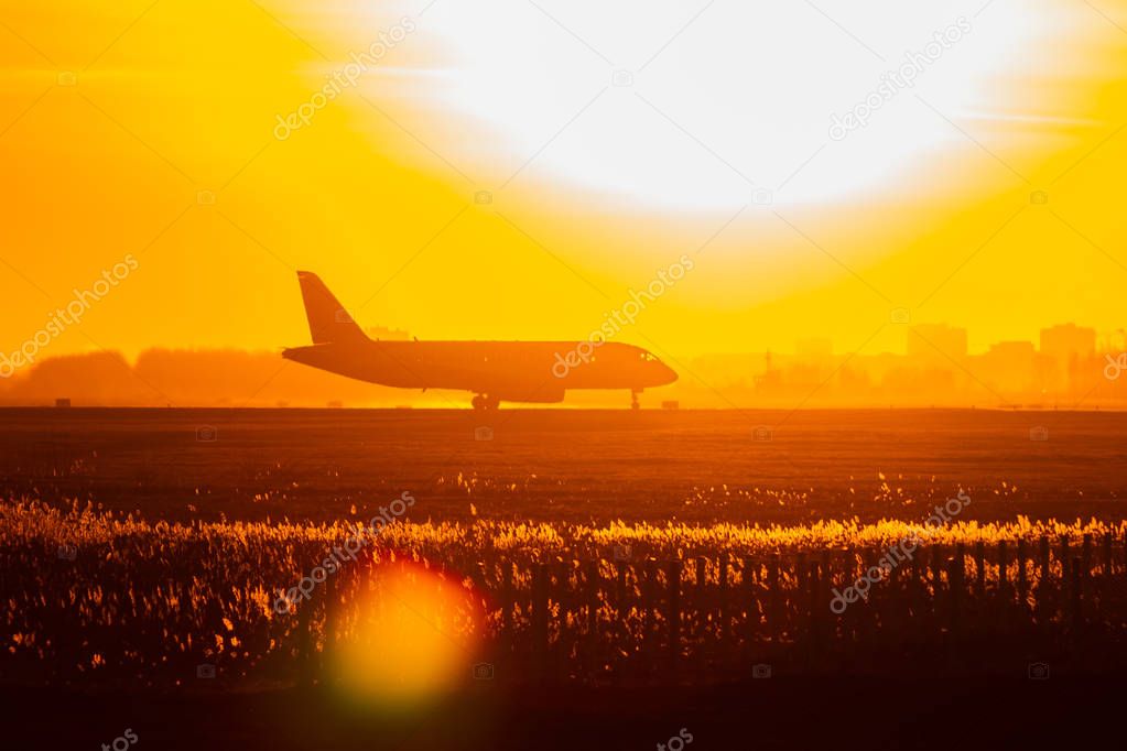 sunset plane on the runway