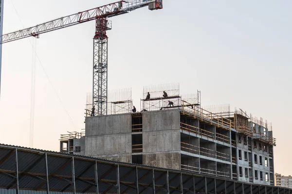 high-rise builders build site overlapping collective building industry professional crane