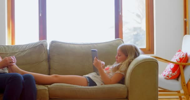 Mother Giving Leg Massage Her Daughter Living Room Home — Stock Video