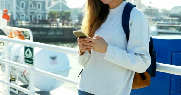 Young Woman Using Mobile Phone While Travelling Ferry — Stock Video