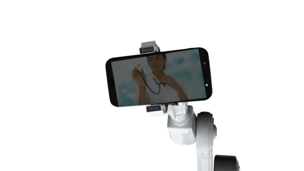 白い背景に 画面上の医療アイコン表示携帯電話を保持している白いロボット アームのデジタル生成ビデオ — ストック動画