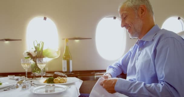 Businessmen Having Meal Private Jet — Stock Video