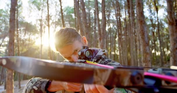 Mature Man Aiming Compound Bow Forest — Stock Video