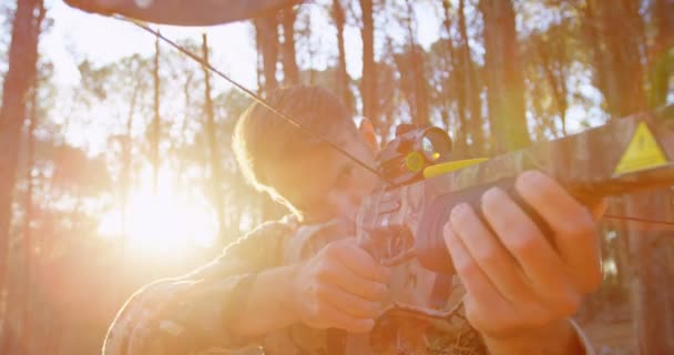Mature Man Aiming Compound Bow Forest — Stock Video