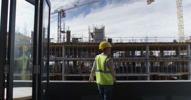 Female Engineer Looking Construction Site Office — Stock Video