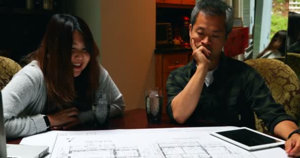 Architects Discussing Blueprint Home — Stock Video