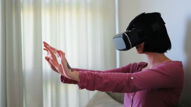 Woman Using Virtual Reality Headset Living Room Home — Stock Video