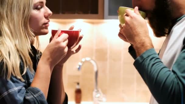 Romantic Couple Kissing While Having Coffee Kitchen Home — Stock Video