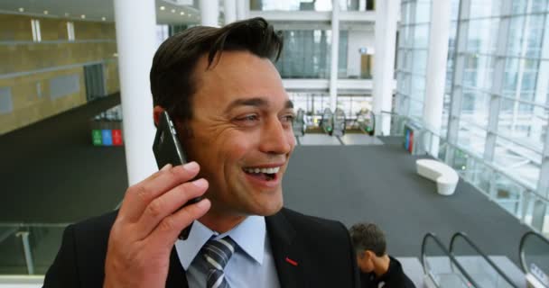 Happy Businessman Talking Phone While Escalator Office — Stock Video