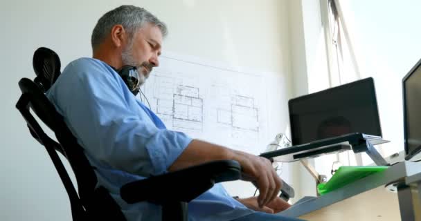 Man Checking Document Desk Home — Stock Video