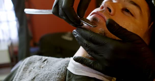 Man Getting His Beard Shaved Straight Razor Barbershop — Stock Video