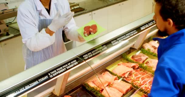 Metzgerei Verkauft Fleisch Kunden Geschäft — Stockvideo