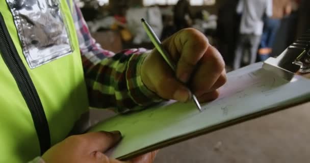 Mid Section Male Worker Writing Clipboard Warehouse — Stock Video