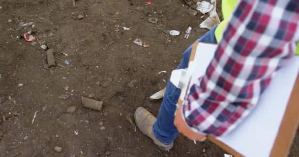 Low Section Male Worker Walking Clipboard Junkyard — Stock Video