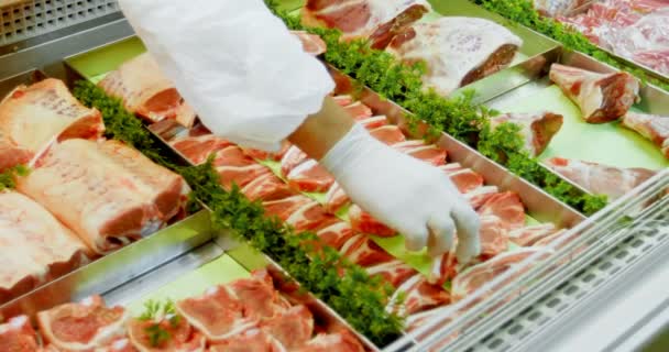 Butcher Arranging Meat Refrigerator Shop — Stock Video