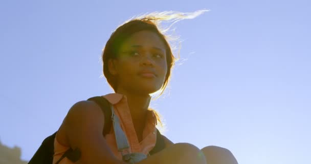 Female Hiker Relaxing Countryside Sunny Day — Stock Video