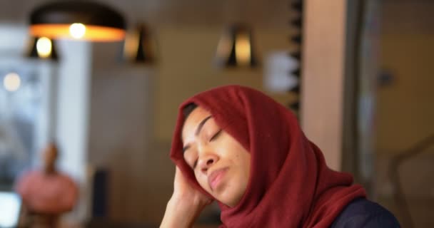 Worried Woman Using Mobile Phone Cafeteria — Stock Video