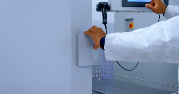 Close Laboratory Technician Using Touch Screen Machine — Stock Video