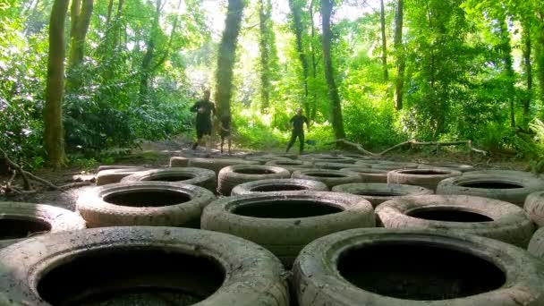 Fit Men Training Tyres Obstacle Course Boot Camp — Stock Video