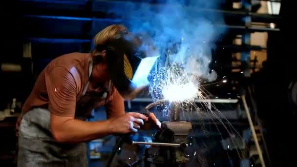 Blacksmith Using Welding Torch Workshop — Stock Video