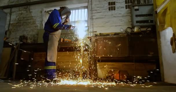 Attentive Metalsmith Using Welding Torch Workshop — Stock Video