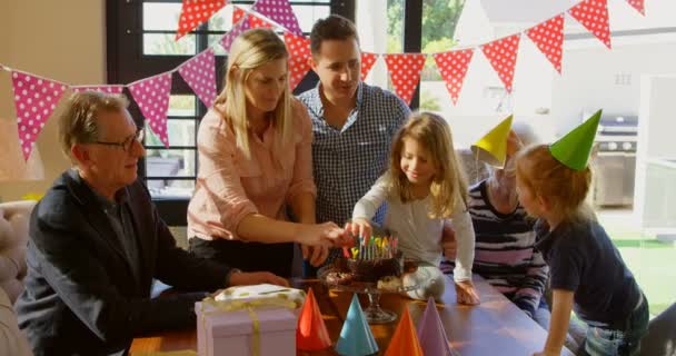 Family Decorating Birthday Cake Living Room Having Fun Together — Stock Video