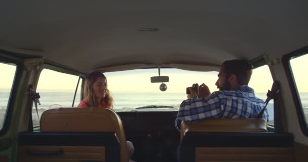 Young Man Clicking Photo Woman Digital Camera Couple Sitting Van — Stock Video