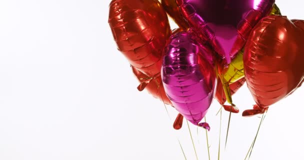 Multicoloured Balloons Floating Air Heart Shaped Balloons Tied String — Stock Video