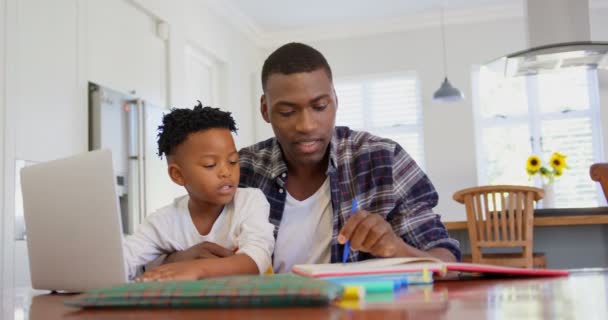 Front View Black Father Helping His Son Homework Comfortable Home — Stock Video