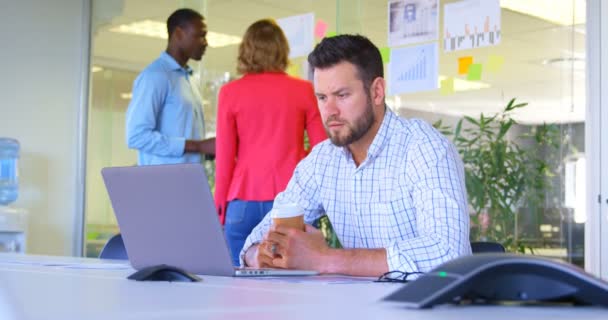 Front View Young Caucasian Businessman Working Laptop Modern Office Coworkers — Stock Video