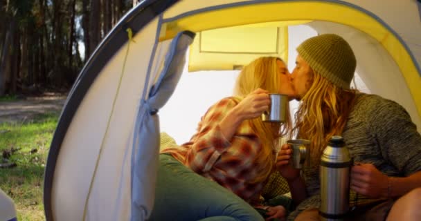 Young Couple Kissing While Having Coffee Tent Couple Drinking Coffee — Stock Video