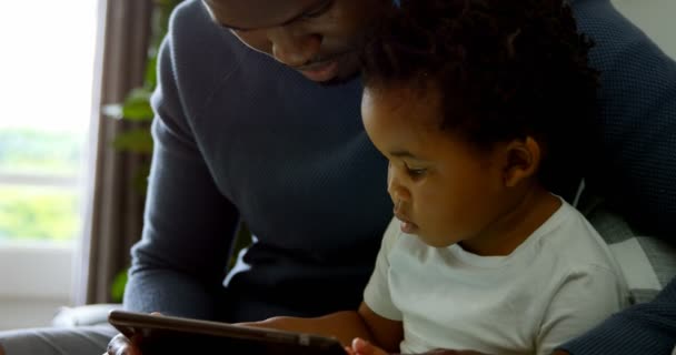 Close Young Black Father Son Using Digital Tablet Comfortable Home — Stock Video